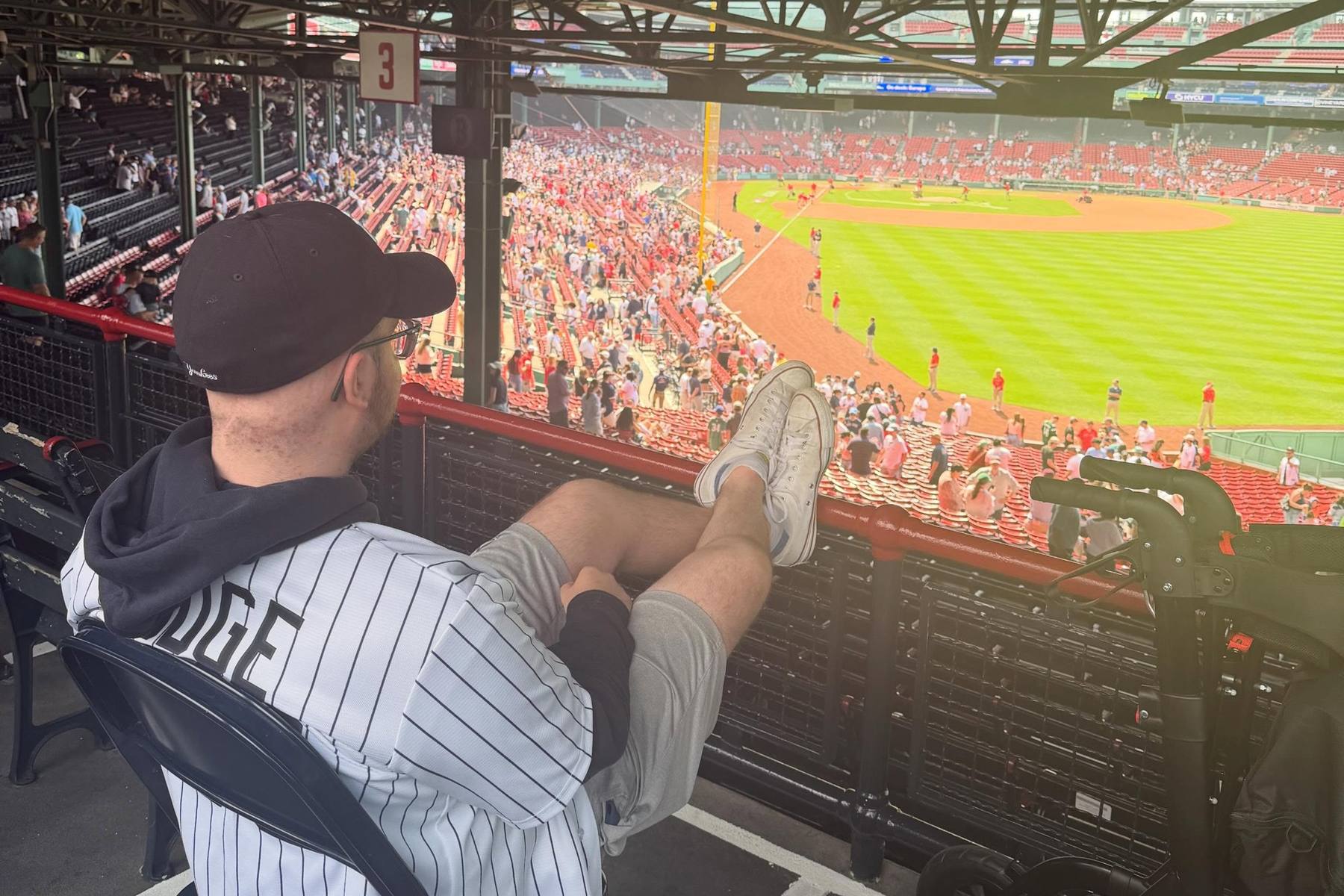 A family enjoying a Red Sox game at Fenway Park